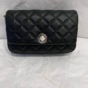 Quilted leather. Natalia turn lock crossbody